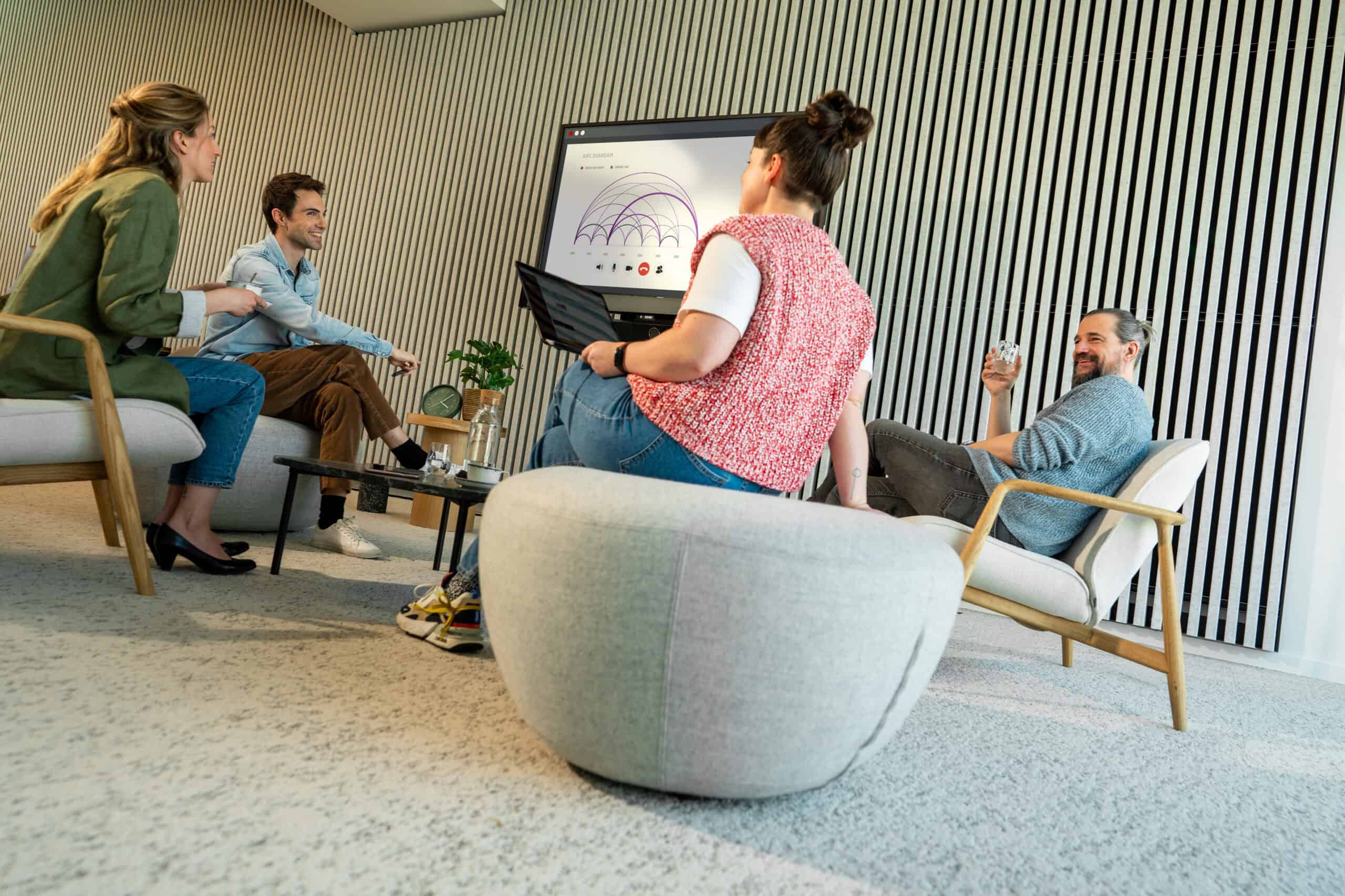 Team meeting with presentation in modern office.